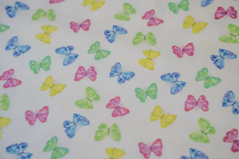 Cotone Bimbo Fantasia Farfalle Colorate
